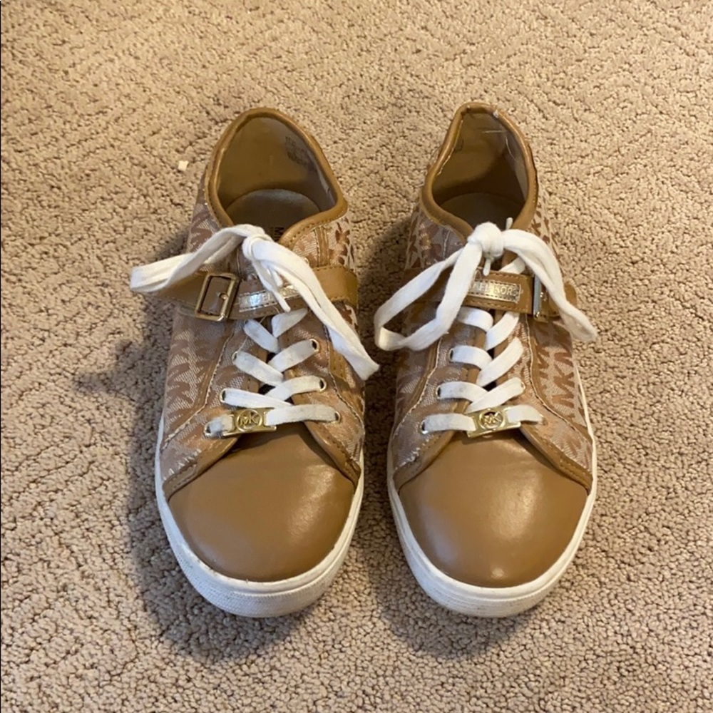 I am selling these brown Michael Kors sneakers.